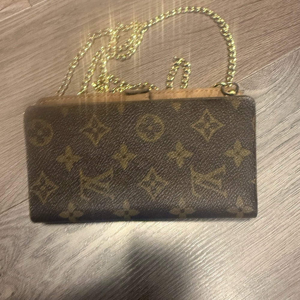 Elegant Louis Vuitton Brown Monogram Wristlet with Gold Chain